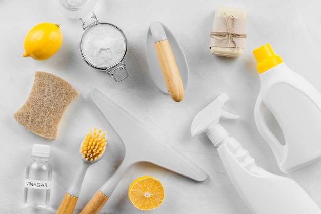 Free photo flat lay of cleaning products with lemon and baking soda