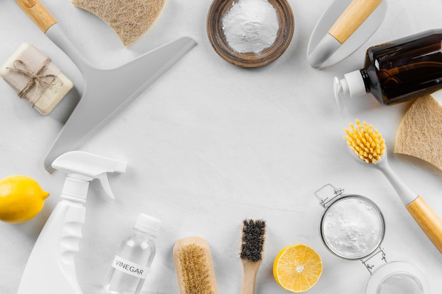 Free photo flat lay of eco cleaning products with lemon and baking soda