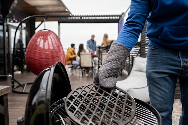 Man preparing barbeque for cooking