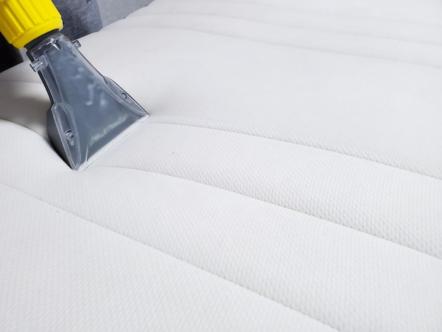 Photo mattress dry cleaning with professional extraction method.