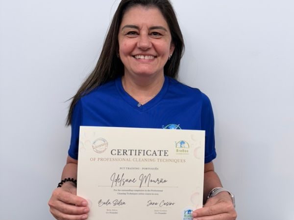Brabos Cleaning member holding its Certificate of professional cleaning Technique